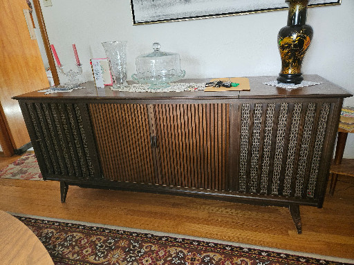 Mid-century modern stereo console cabinet with slatted speaker grilles