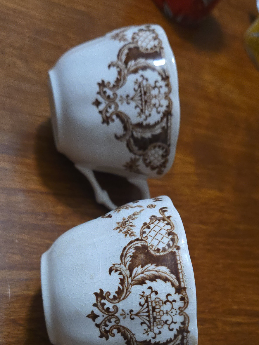 Porcelain teacups with brown transferware pattern from Nikko's 'Windsor Brown' collection