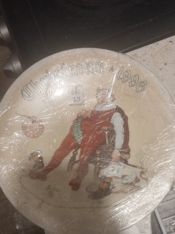 Porcelain collector plate titled 'Christmas 1996' by Norman Rockwell