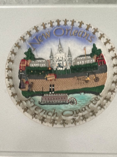 Ceramic decorative plate titled 'New Orleans French Quarter' by unknown maker