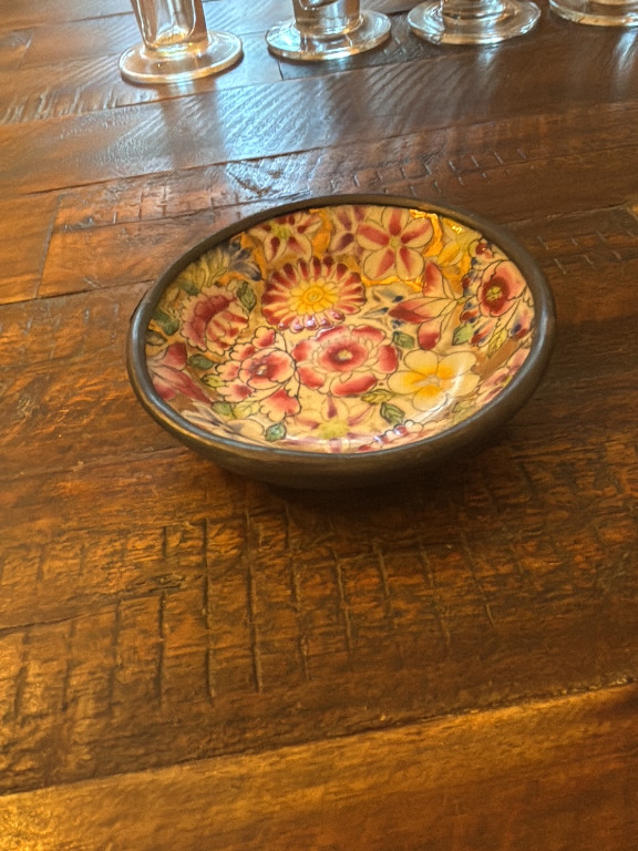 Porcelain decorative bowl with hand-painted floral design