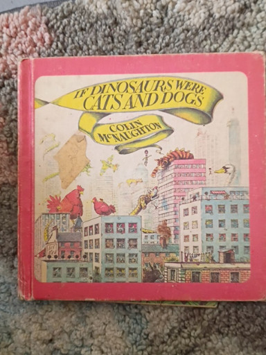 Hardcover children's book titled 'If Dinosaurs Were Cats and Dogs' by Colin McNaughton