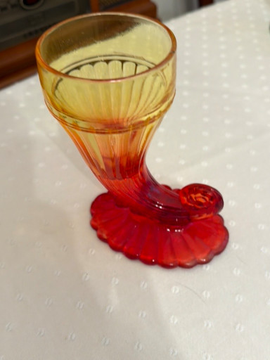 Amberina glass cornucopia vase with yellow-to-red ombre gradient