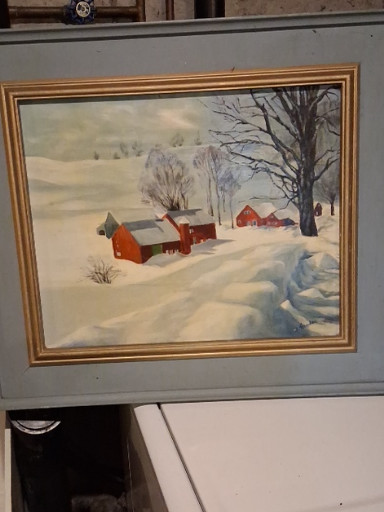 Oil painting depicting a winter rural landscape with red barns