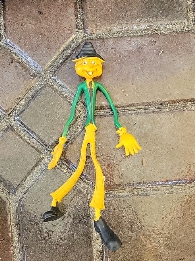 Vintage bendable scarecrow toy by Fun World, made in Hong Kong