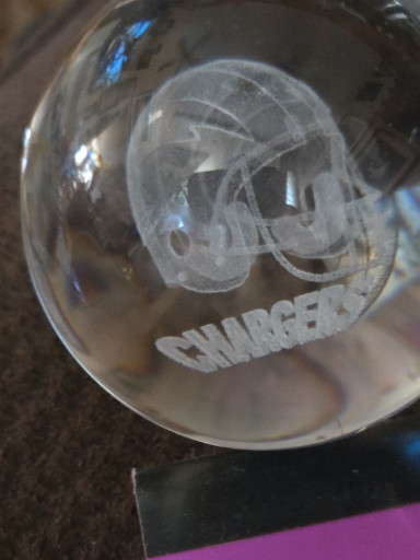 Crystal glass paperweight with etched San Diego Chargers NFL helmet and team name