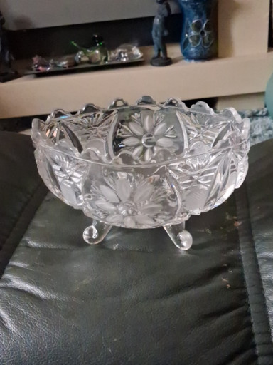 Pressed glass footed bowl with floral and geometric cut pattern
