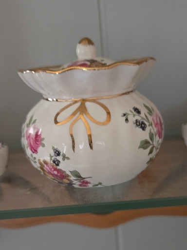 Fine bone china sugar bowl with floral decoration and gold trim by Allyn Nelson Collection