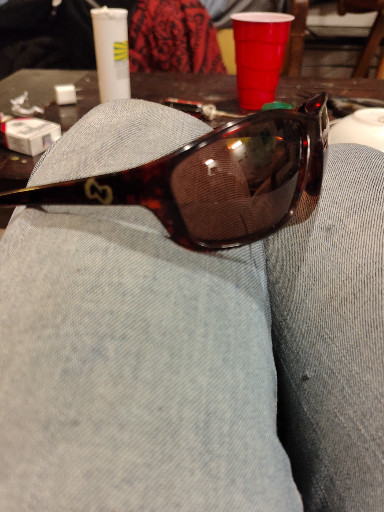 Modern sport sunglasses with tortoiseshell frame and brown polarized lenses