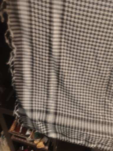 Black and white houndstooth check scarf with fringe