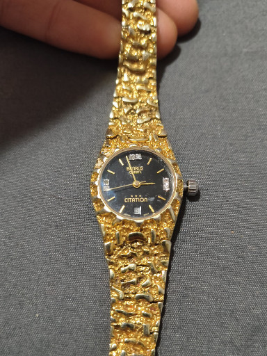 Gold-tone quartz wristwatch with textured nugget-style bracelet by Waltham