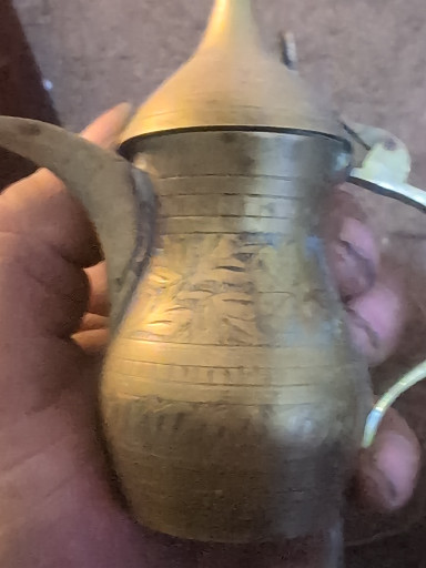 Brass dallah (traditional Arabic coffee pot)