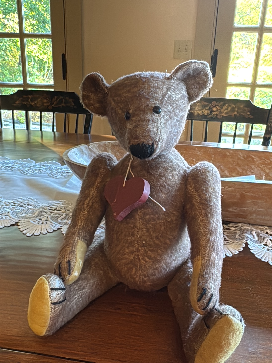 Vintage mohair teddy bear with shoe button eyes and jointed limbs