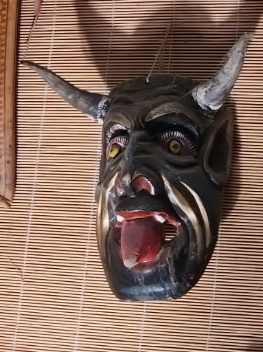 Carved wooden devil mask from Guerrero, Mexico