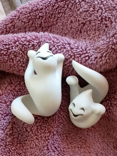 Ceramic ghost figurines, set of two playful Halloween decorative pieces
