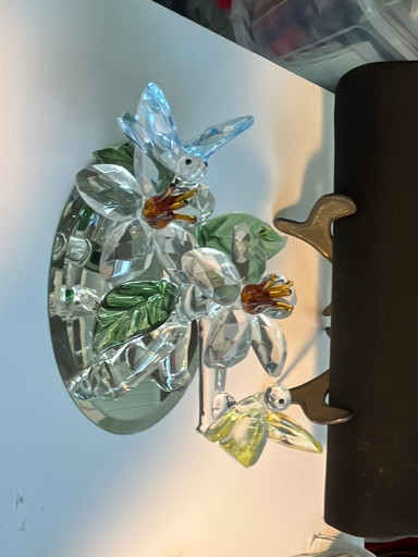 Crystal glass figurine depicting a butterfly on flowers