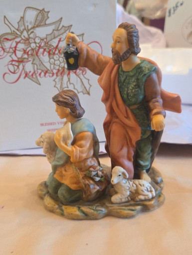 Porcelain nativity figurine 'Blessed Visitors' from Avon Holiday Treasures collection