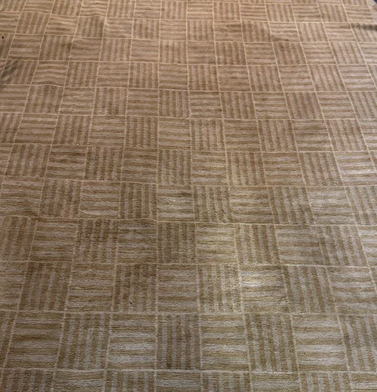 Tibetan hand-knotted wool area rug with geometric basketweave pattern