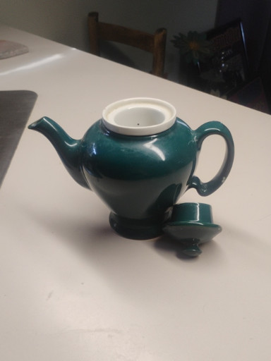 Ceramic teapot in teal green glaze by Hall China for McCormick Tea