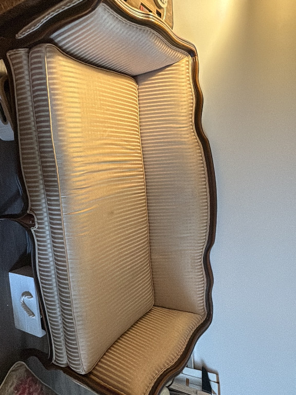 Upholstered loveseat settee with carved wood frame in French Provincial style by Henredon