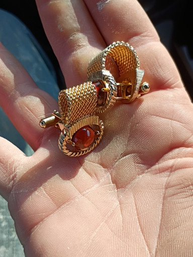 Gold-tone mesh wrap cufflinks with amber-colored cabochons, circa 1960s