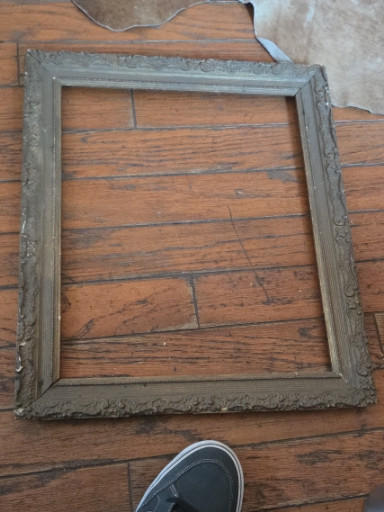 Antique wood and gesso picture frame with ornate detailing