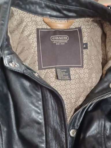 Black leather jacket by Coach