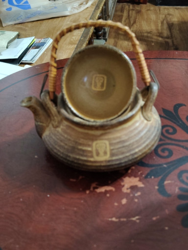 Stoneware teapot with bamboo handle, marked 'Made in Japan'
