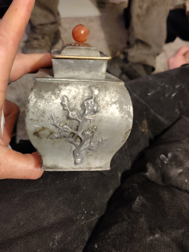 Pewter tea caddy with carnelian stopper and applied floral decoration
