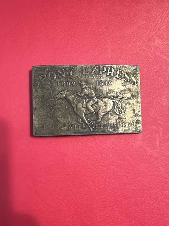 Brass belt buckle titled 'Pony Express from 1849 - First with the U.S. Mail'