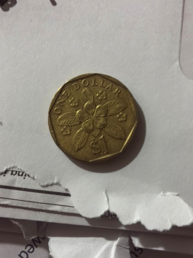 Aluminum-bronze coin, Singapore 1 Dollar featuring the Lion Fish design