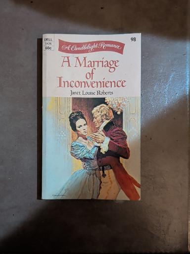 Paperback romance novel titled 'A Marriage of Inconvenience' by Joyce Louise Roberts, published by Dell as part of the Candlelight Regency Romance series