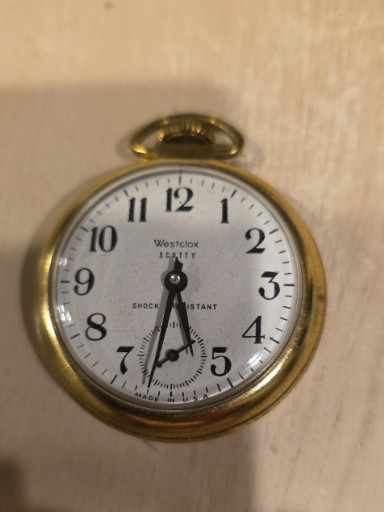 Brass-cased pocket watch titled 'Scotty' by Westclox