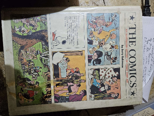 Hardcover book titled 'The Comics: An Illustrated History of Comic Strip Art' by Jerry Robinson