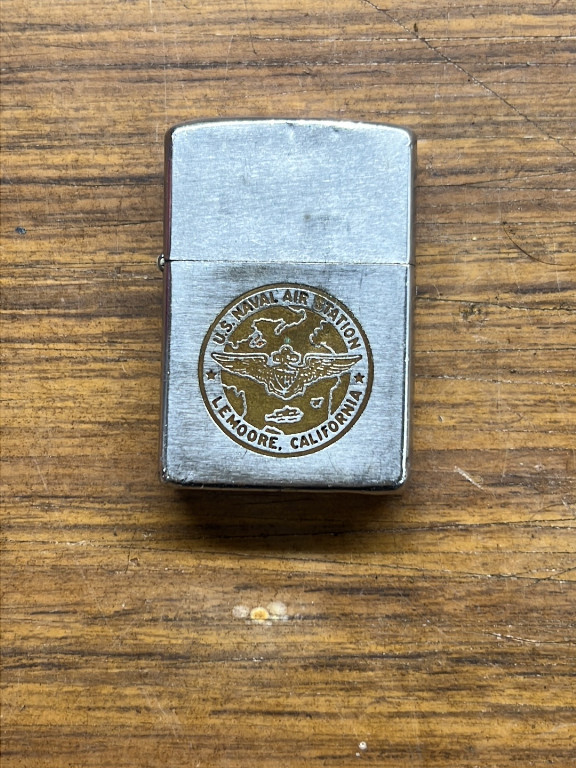 Zippo lighter with U.S. Naval Air Station Lemoore, California emblem