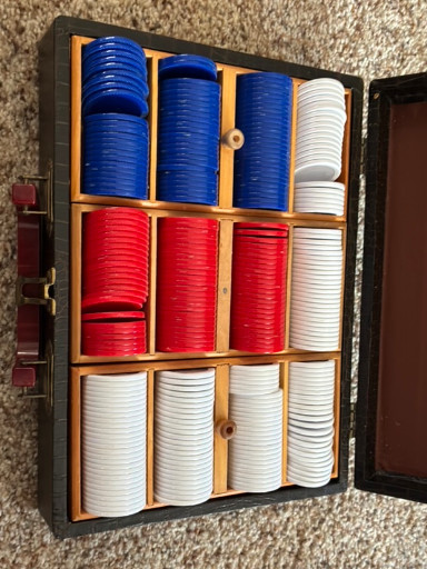 Vintage Lowe poker chip set in wooden carrying case