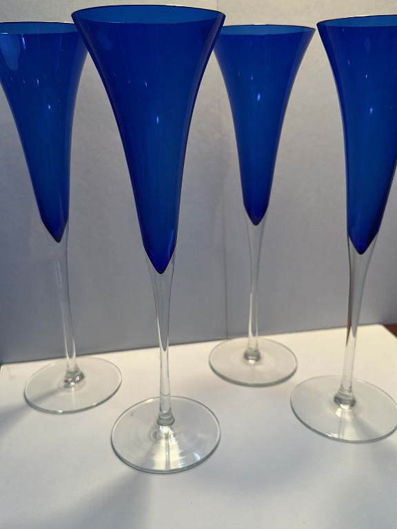 Cobalt blue champagne flutes with clear stems