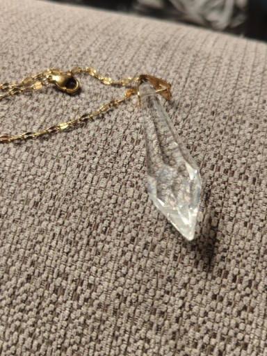 Gold-tone chain necklace with faceted clear crystal teardrop pendant