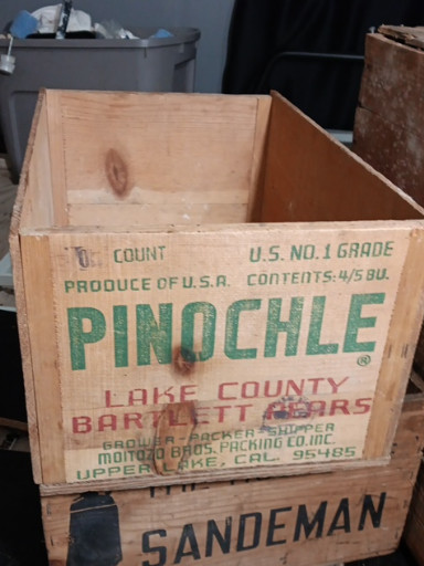 Vintage wooden fruit crate labeled 'Pinochle' from Lake County Bartlett Pears, Upper Lake, California