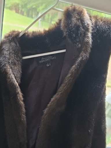 Faux fur vest by Fabulous Furs