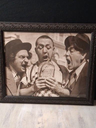 Framed vintage photograph of The Three Stooges comedy trio