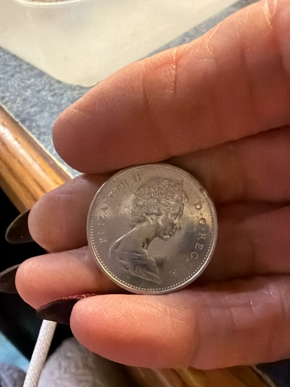 Canadian silver dollar featuring Queen Elizabeth II, 1966