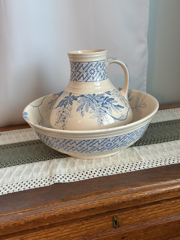 Ceramic wash basin and pitcher set with blue floral and geometric designs