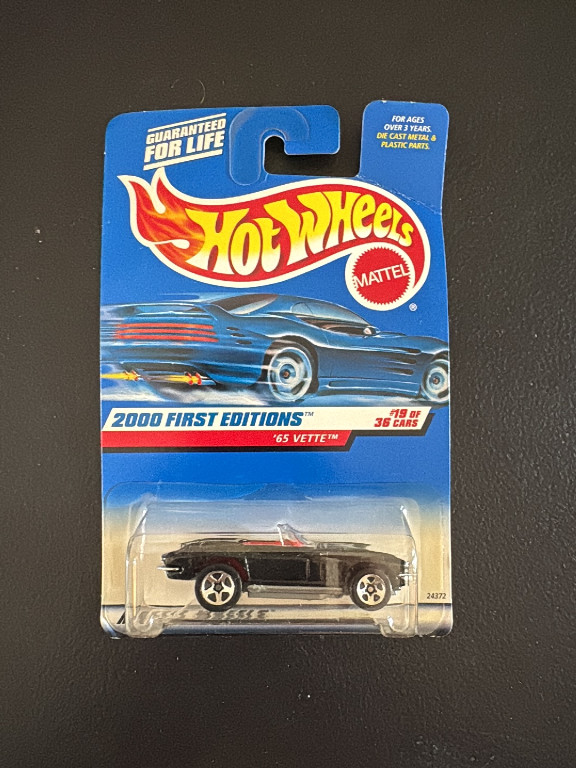 Die-cast metal toy car Hot Wheels '65 Vette by Mattel