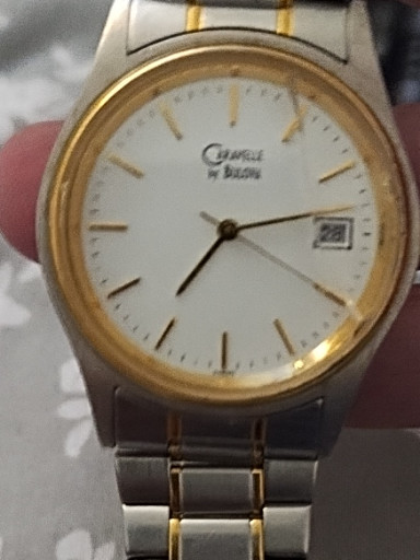 Two-tone stainless steel and gold-plated quartz watch by Caravelle by Bulova