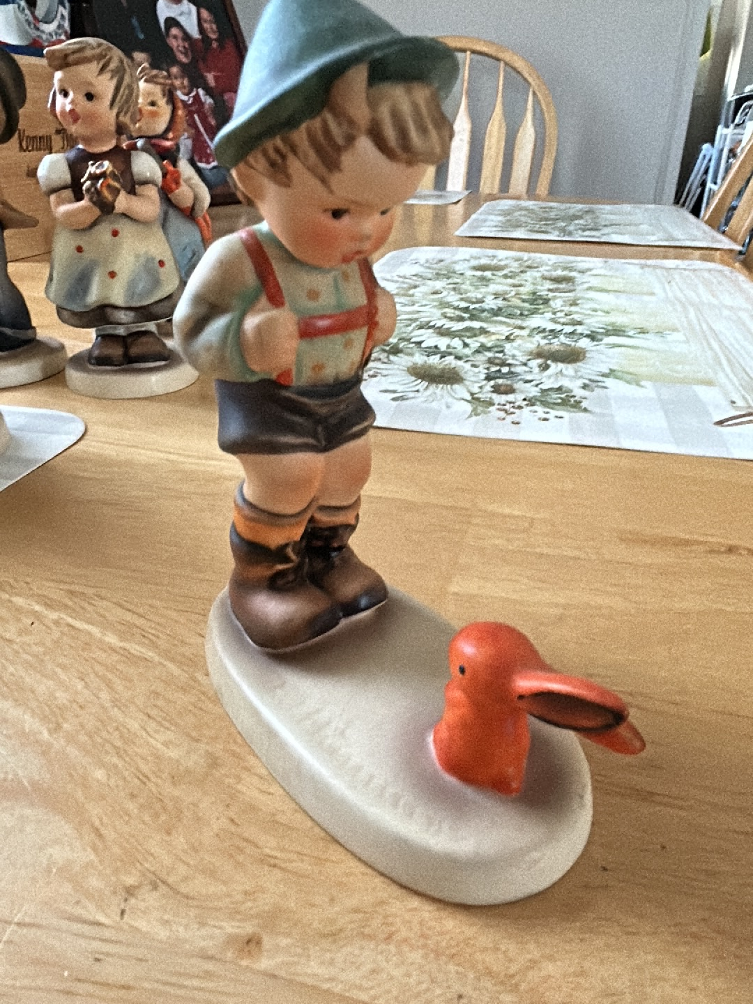 Porcelain figurine titled 'Sensitive Hunter' by Hummel/Goebel