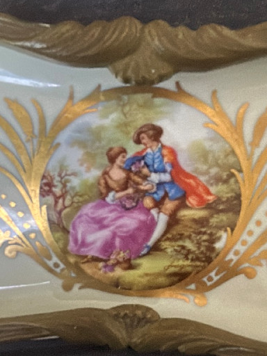 Porcelain compote with hand-painted romantic scene and gilt bronze mounts