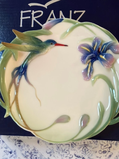 Porcelain decorative plate titled 'Long Trail Hummingbird and Iris' by Franz Porcelain
