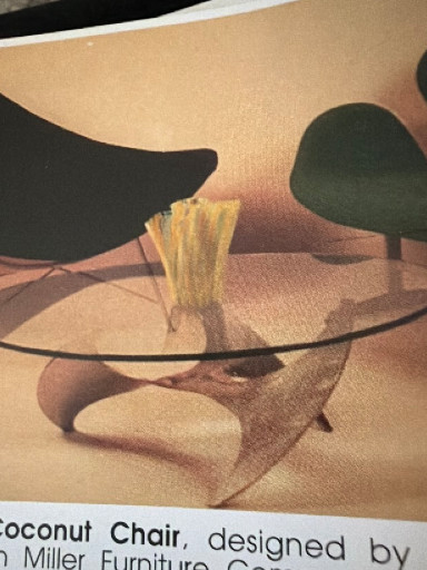 Glass and wood sculptural coffee table titled 'Coconut Chair' by Herman Miller Furniture Company
