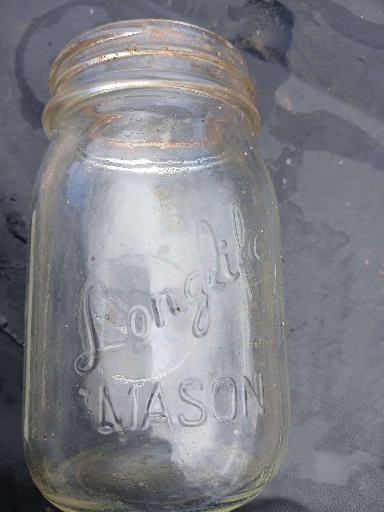 Clear glass pint canning jar marked 'Longlife Mason' by Lauren's Quality Glass